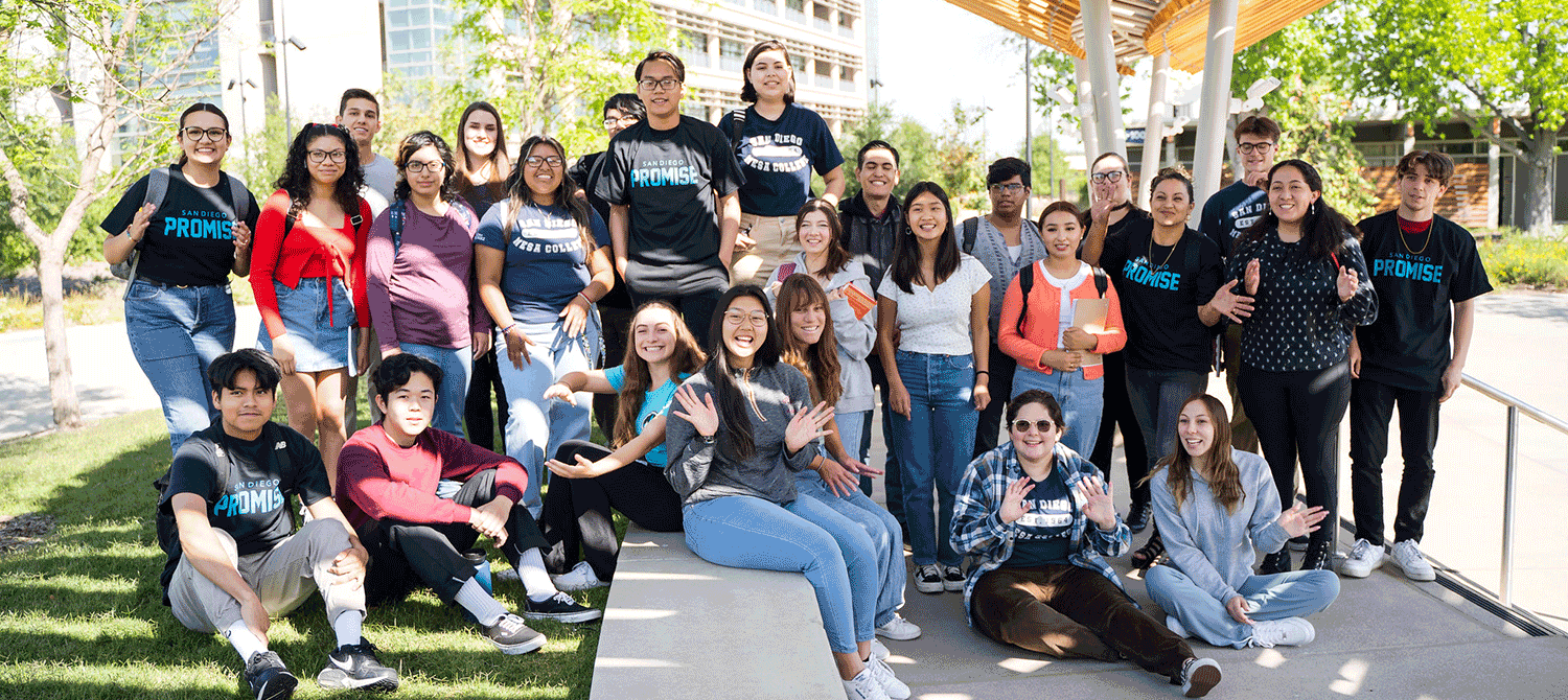 A group of promise students outside on the grass in the mesa quad