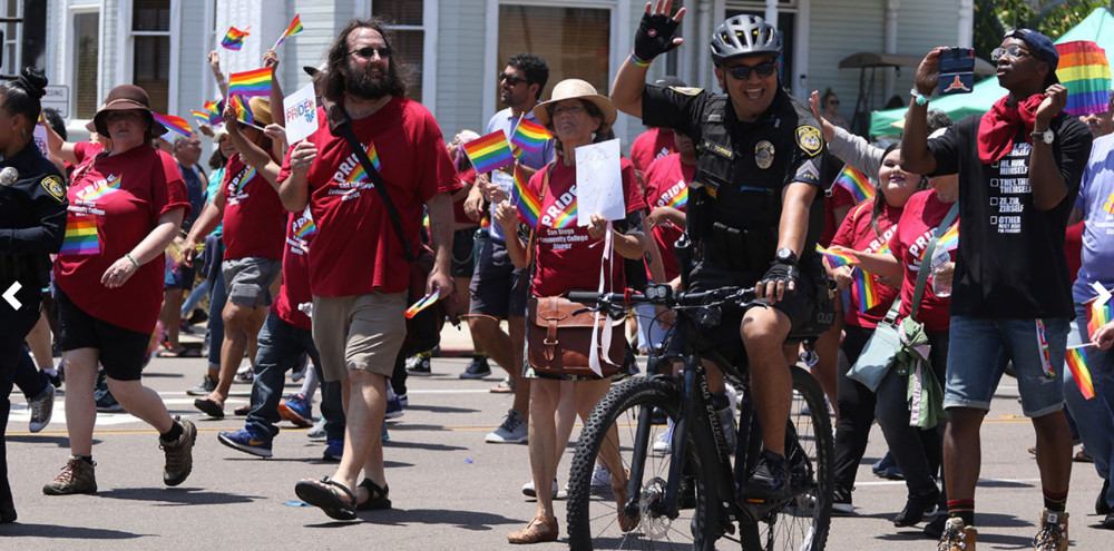 Officer participating in Pride Parade