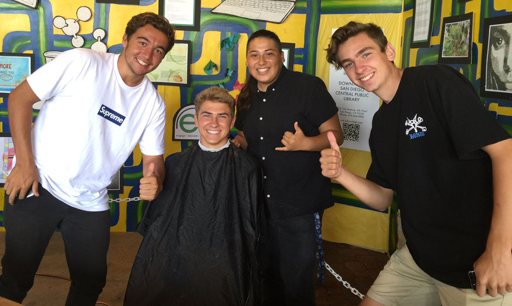 Cosmetology students show of the new haircut of a San Diego County Fair patron