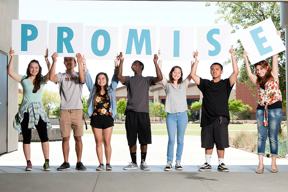 Students at Miramar college hold up letters spelling Promise