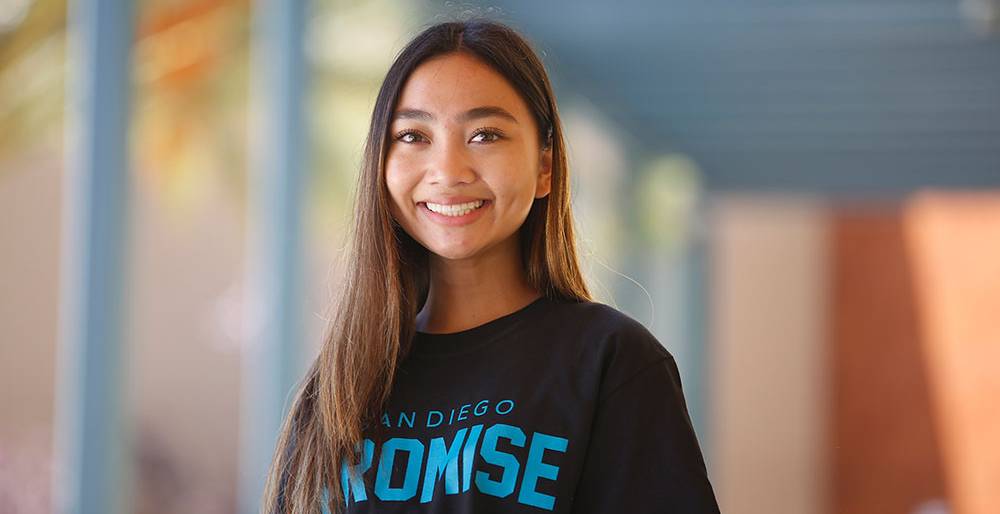 A student wears a San Diego Promise t-shirt