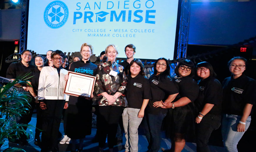 Annette Bening poses with the chancellor, mesa college president, and promise students