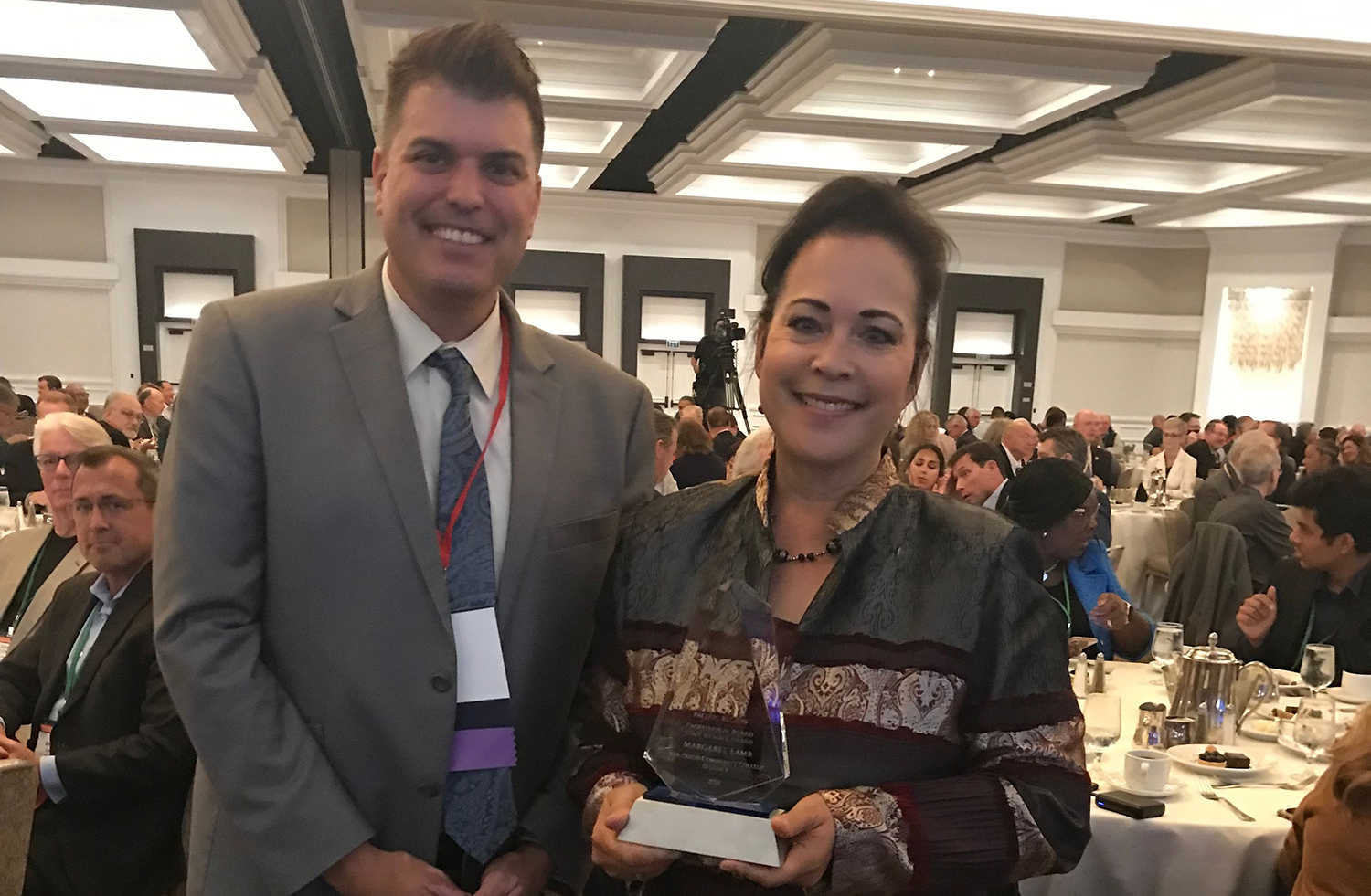 Chancellor Cortez with Margaret Lamb holding her award.