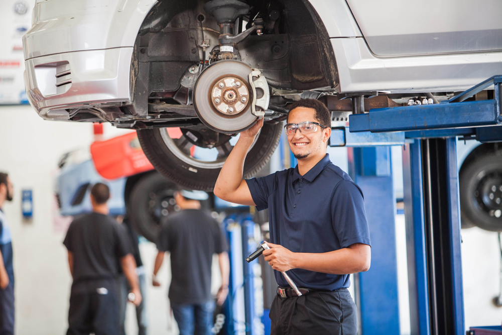 A student works on a car in the auto tech class at Miramar College