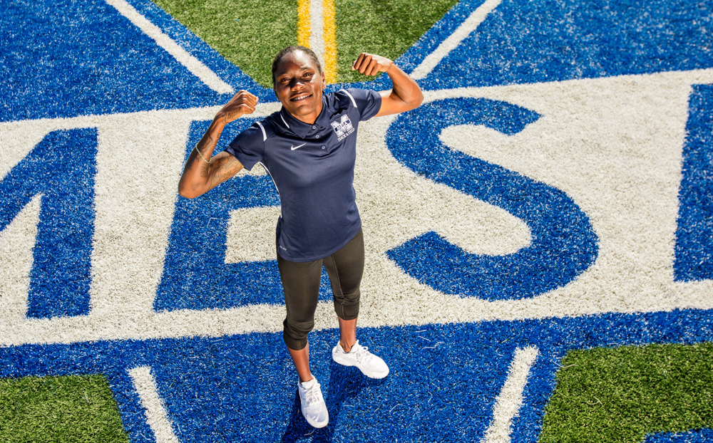 Brittney Reese flexes her muscles at the Mesa College track