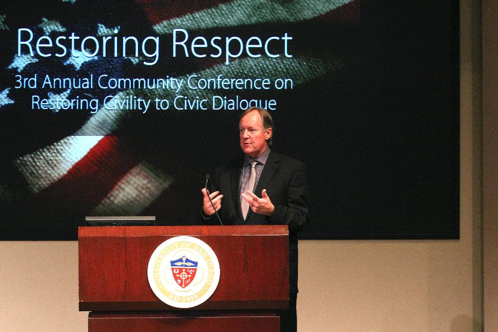 Carl Luna hosting last year’s Restoring Respect conference held at USD