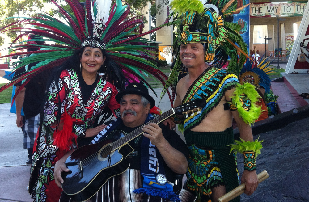 Ramon "Chunky" Sanchez with Danza Azteca Capulli Mexihca Aida and Juan Flores.  The group is scheduled to perform during the Grand Opening event on October 28 for the César E. Chávez Continuing Education. 