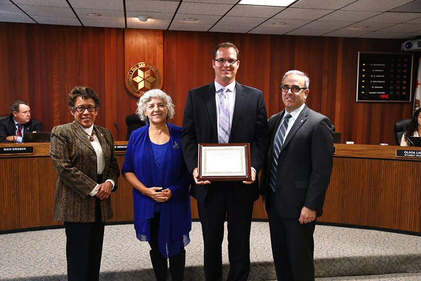 Tom Fine, owner of JE Moore Consulting wass honored by San Diego Community College District.