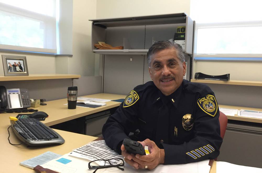 Lieutenant Gilbert Torres in his office.