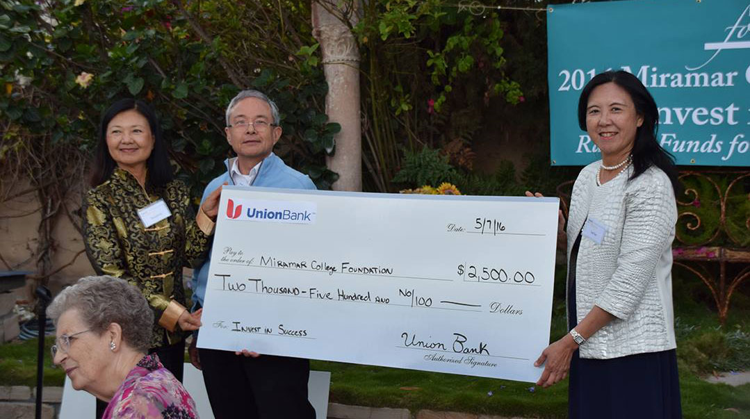 A giant check for $2,500 is donated to the Miramar College Foundation from Union Bank