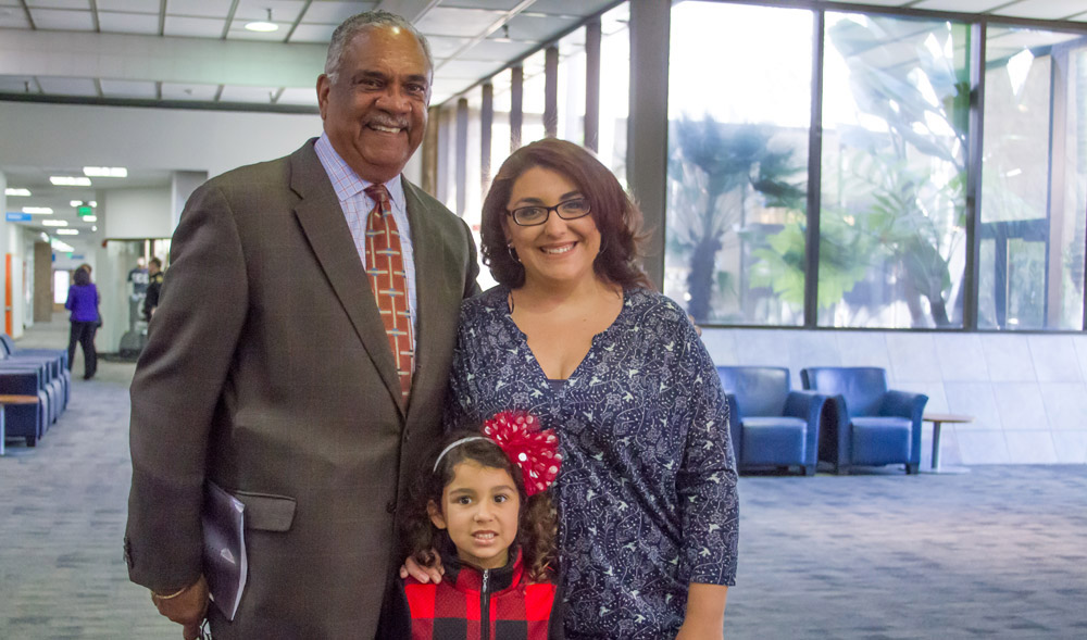 Angel Woods, her daughter and Rescue Mission CEO Herb Johnson 