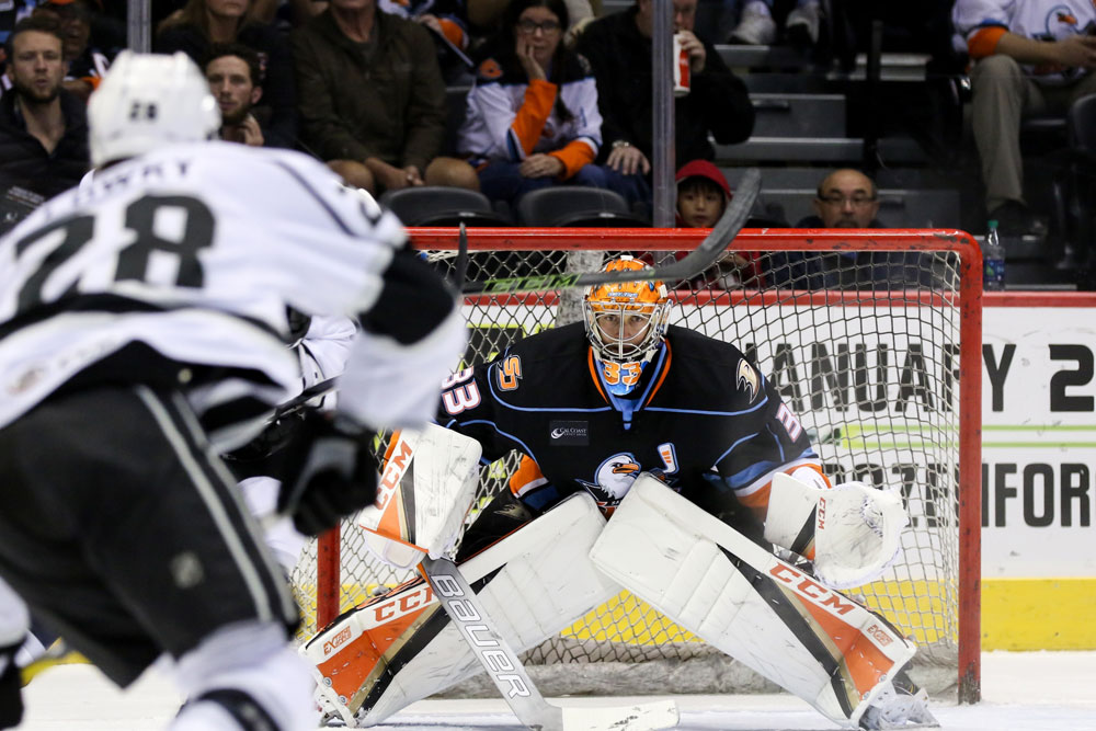 The San Diego Gulls goalie guards the front of the goal