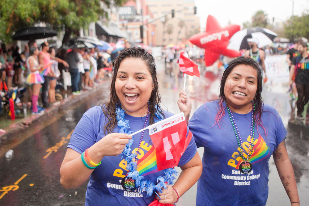 Two ladies march in the 2015 San Diego Pride Parade
