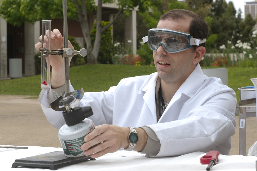 A San Diego City College student works on an experiment