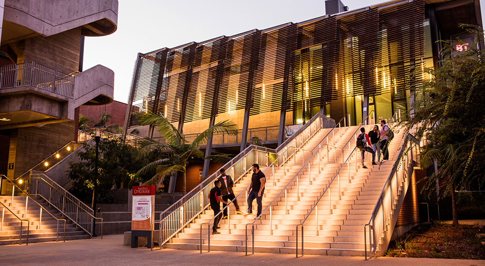 Stairs are lit up at night at City College. 