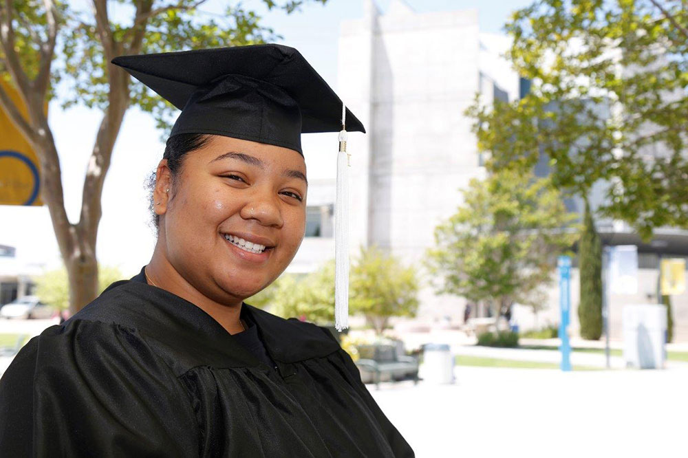 Promise student Maia Wakefield in her cap and gown