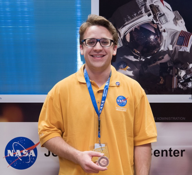 Christian Pratt shows his Nasa medal