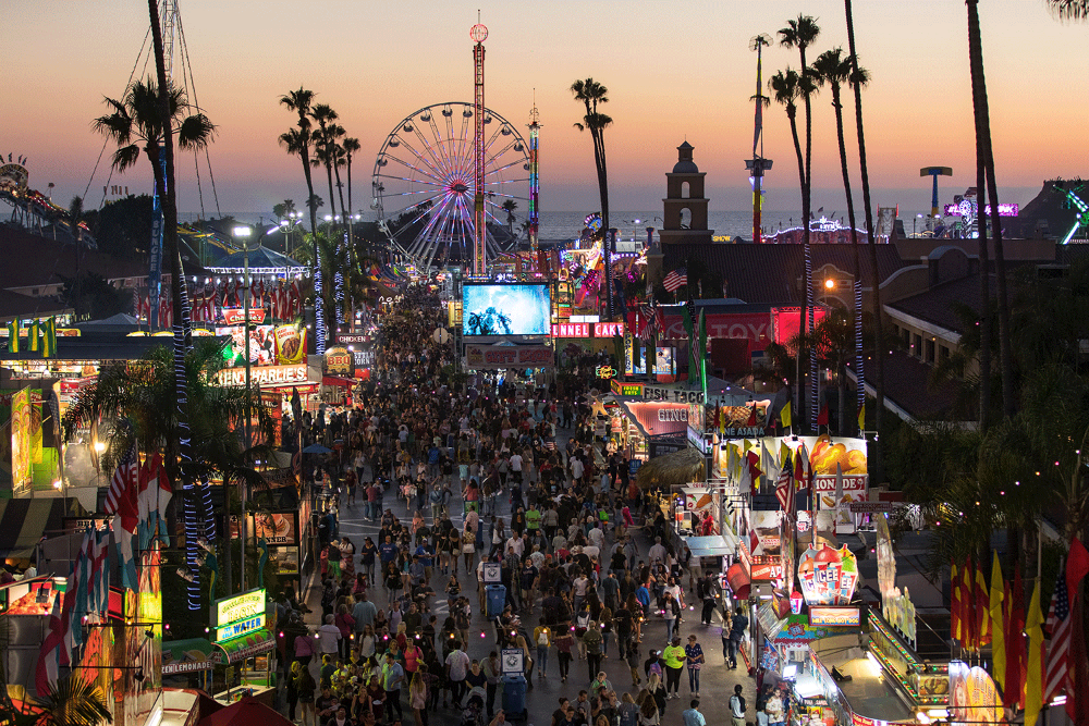 The ferris wheel at the fair at dusk