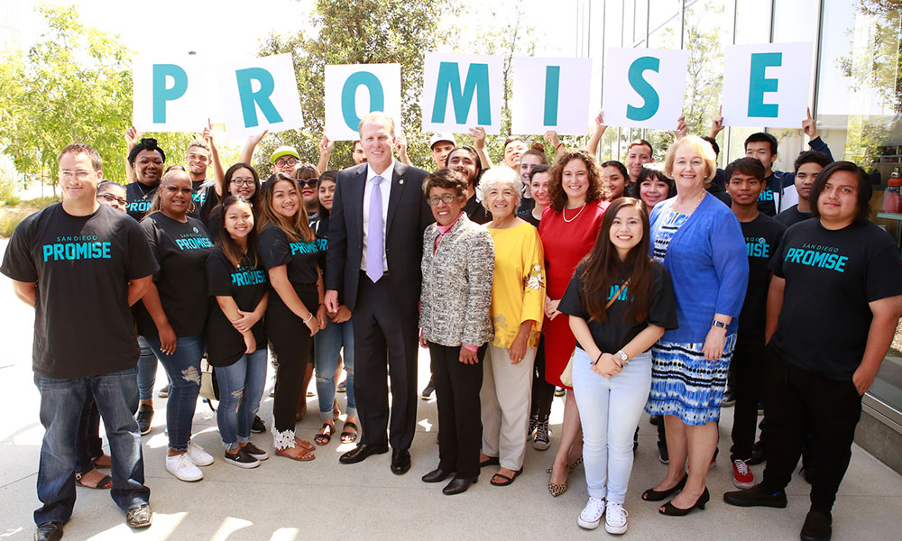 the chancellor and the mayor at a news conference with promise students