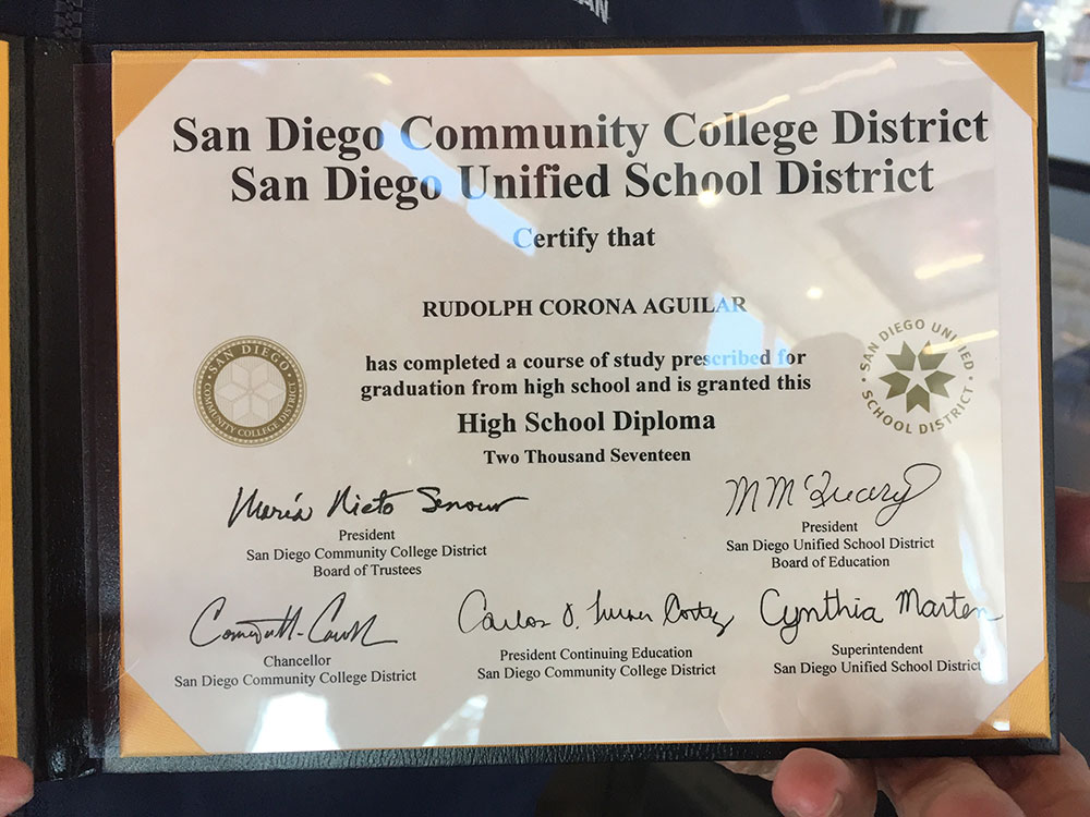 a close up of rudy aguilar's high school diploma