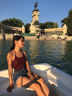 Allison Tjan on a boat in Parque de Buen Retiro in Madrid.