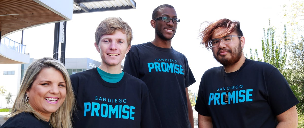 Four promise students wearing promise t-shirts