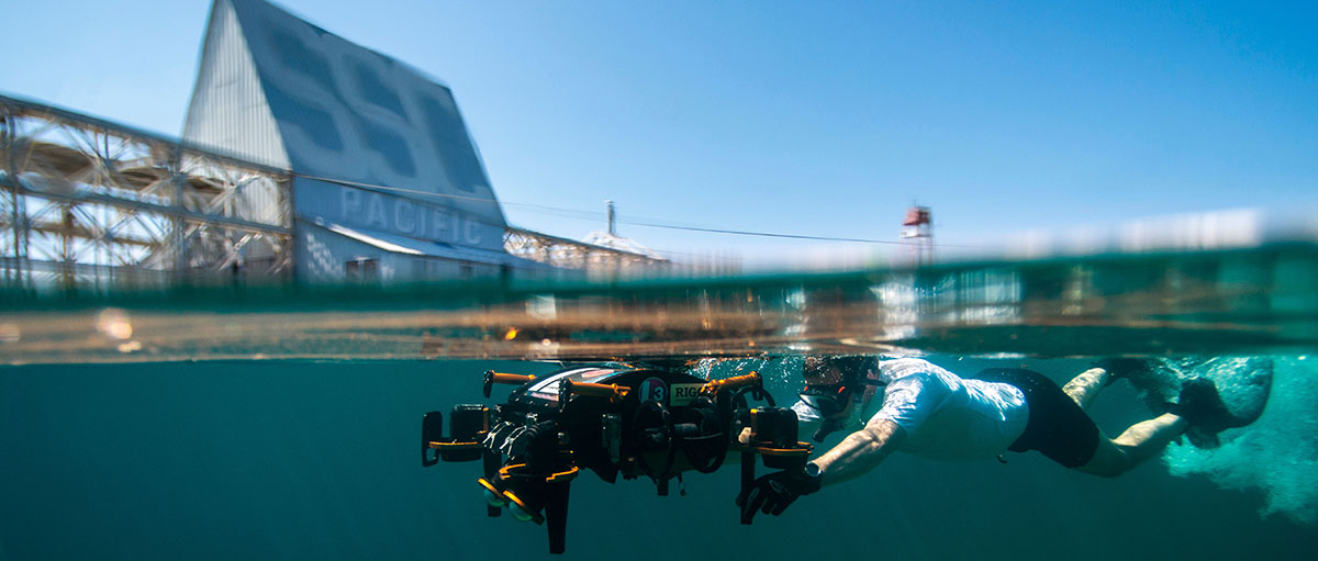 A diver uses underwater equipment