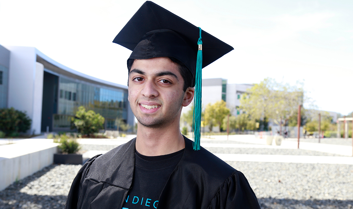 Zeesham Mohamedy in his cap and gown