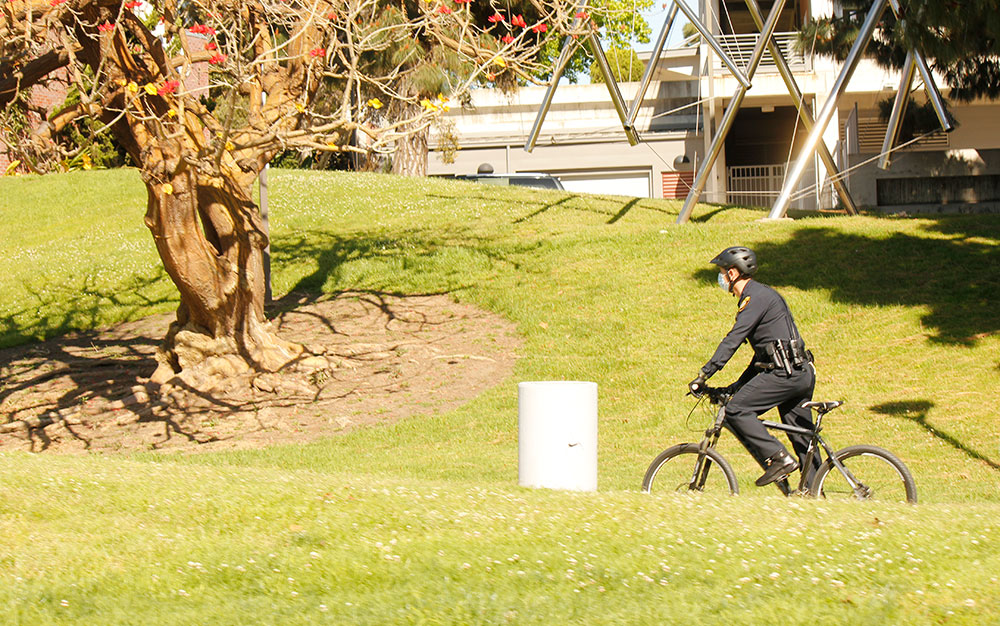 A service officer on a bicycle patrol