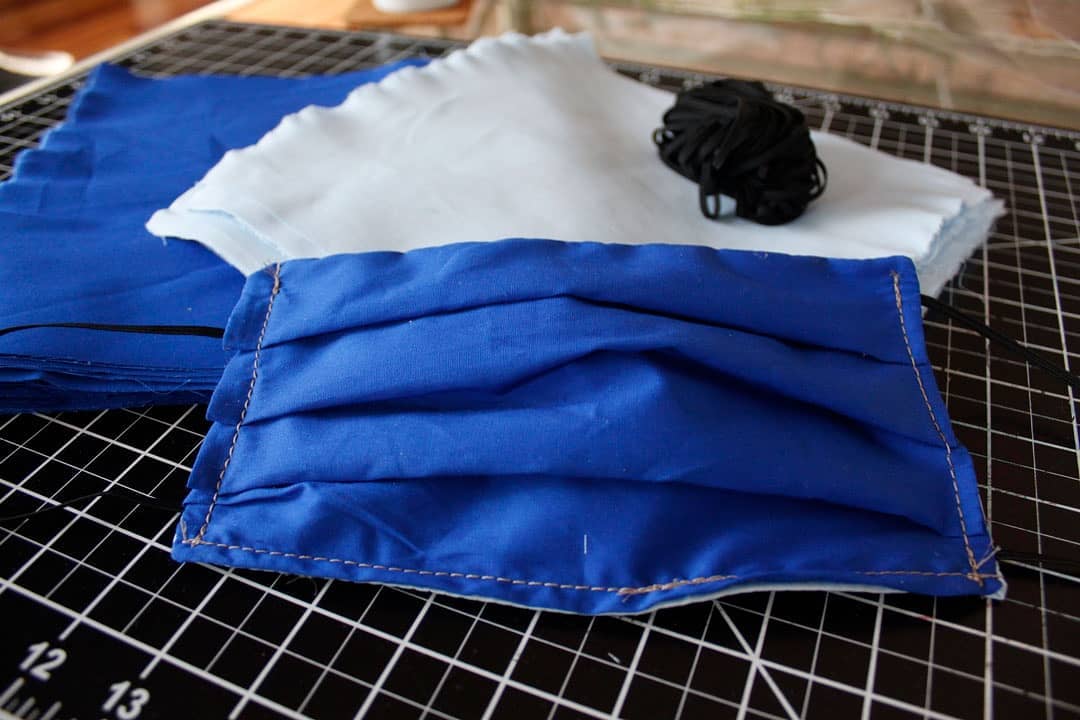 blue masks sewn by students