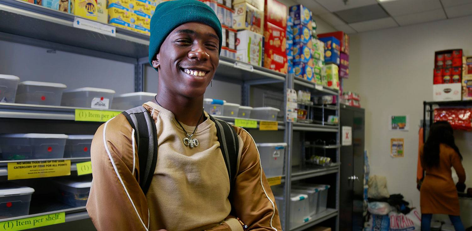 Student Rickanian Williams in the Mesa Food Pantry