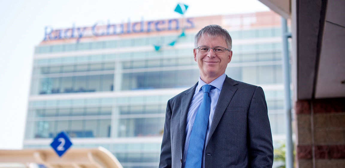 Dr. Stephen Kingsmore standing outside of Rady Children's Hospital.