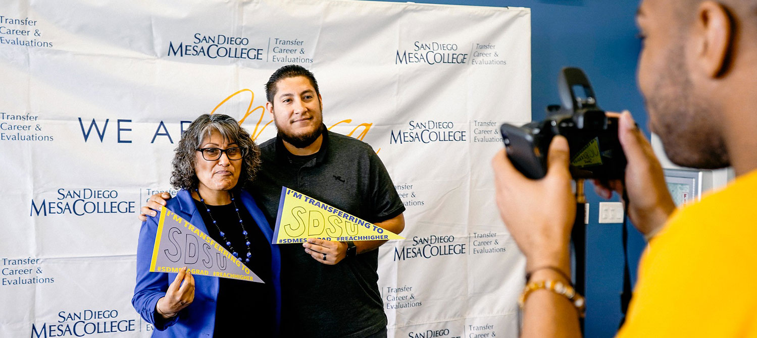 Two students who are transferring to San Diego State pose for a picture