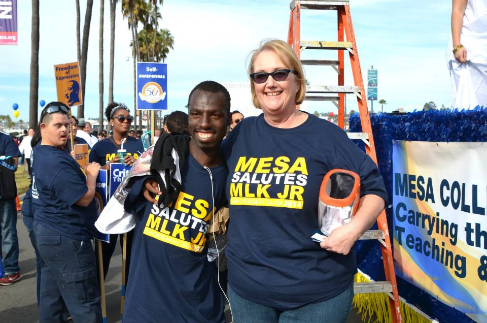 Pam Luster with a student during the MLK parade in 2015.