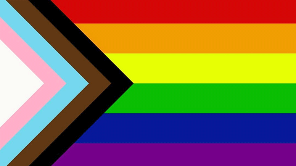 The Progress Pride flag has the rainbow pride with black and brown stripes to represent marginalized LGBTQ+ communities of color, along with the colors pink, light blue and white, which are used on the Transgender Pride Flag flag with 