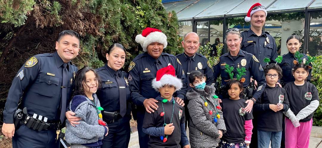 Finished eating breakfast at Sea World and headed to a private dolphin show. Photo from left to right – Volunteers Sergeant Torres, Detective Rocha, Field Training Officer Diaz, Chief Ramos, Field Training Officer Obara, Officer Rustvold and Officer Stransky.