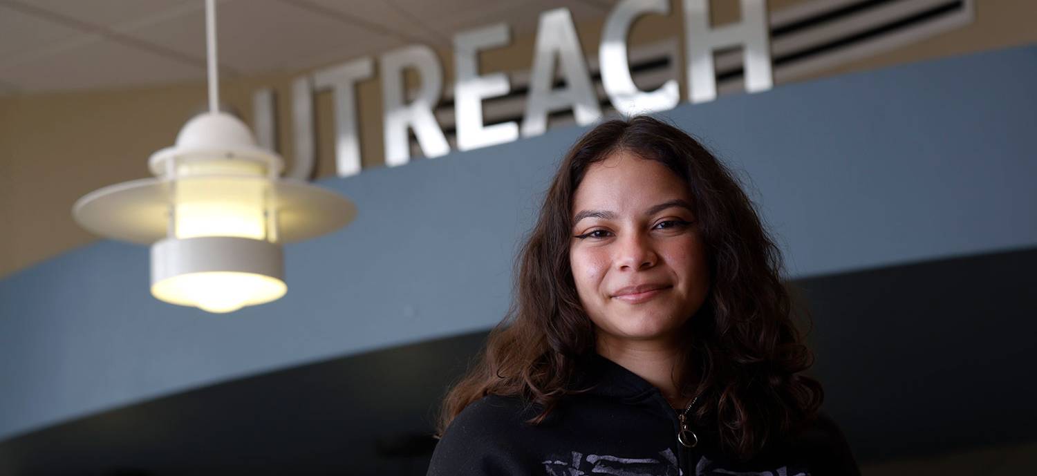 Breanna Hinojosa stands in front of the outreach office at Miramar College Breanna Hinojosa stands in front of the outreach office at Miramar College