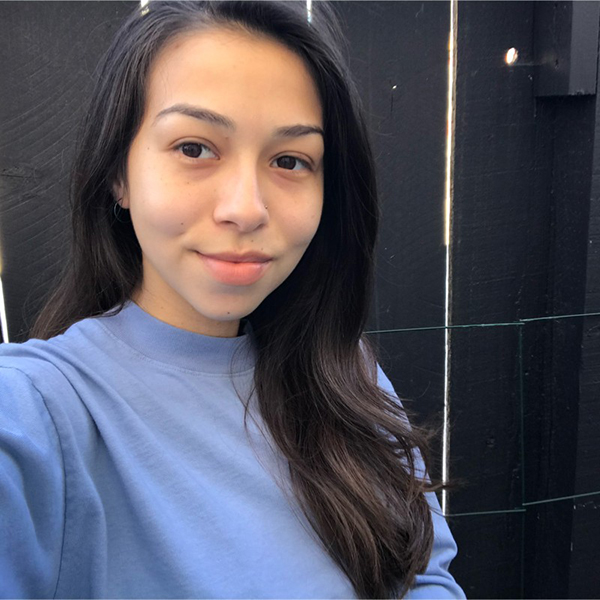 Carmen Leedham wearing a lavender sweater