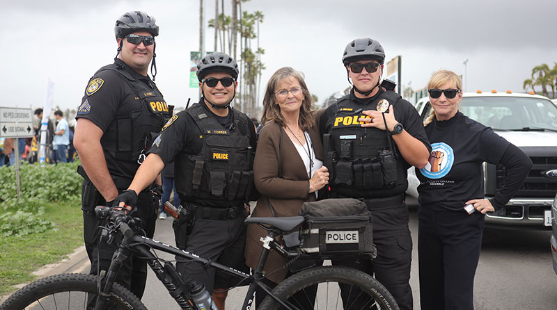 College police in uniform on bicycles at the MLK Parade