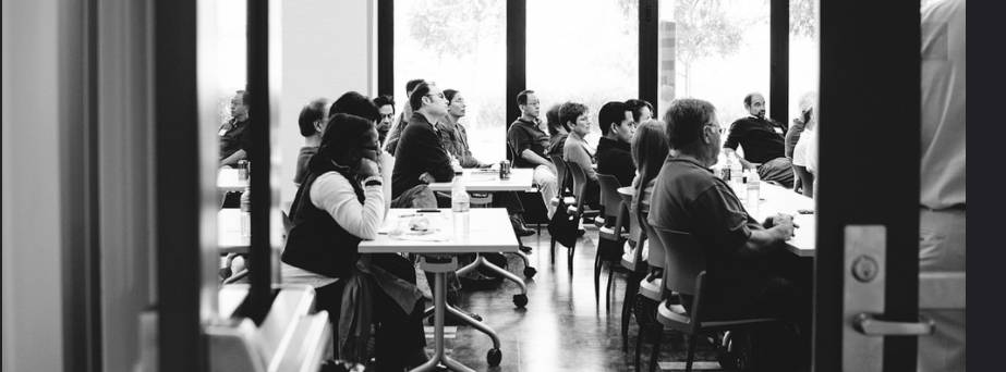 A black and white photo of students in a classroom