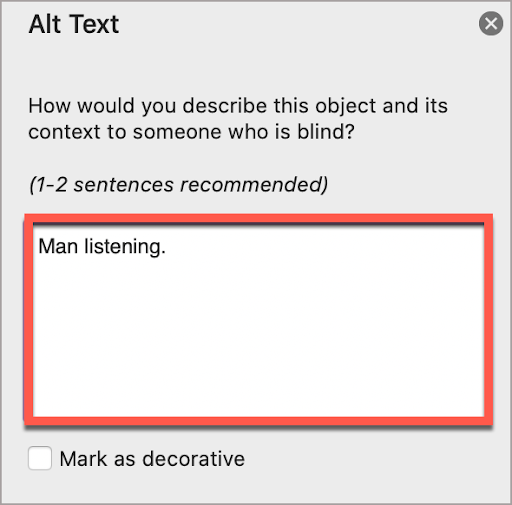 In the PowerPoint Alt Text window, write the alt text in the box.  In this case, the alt text is, “Man listening.”
