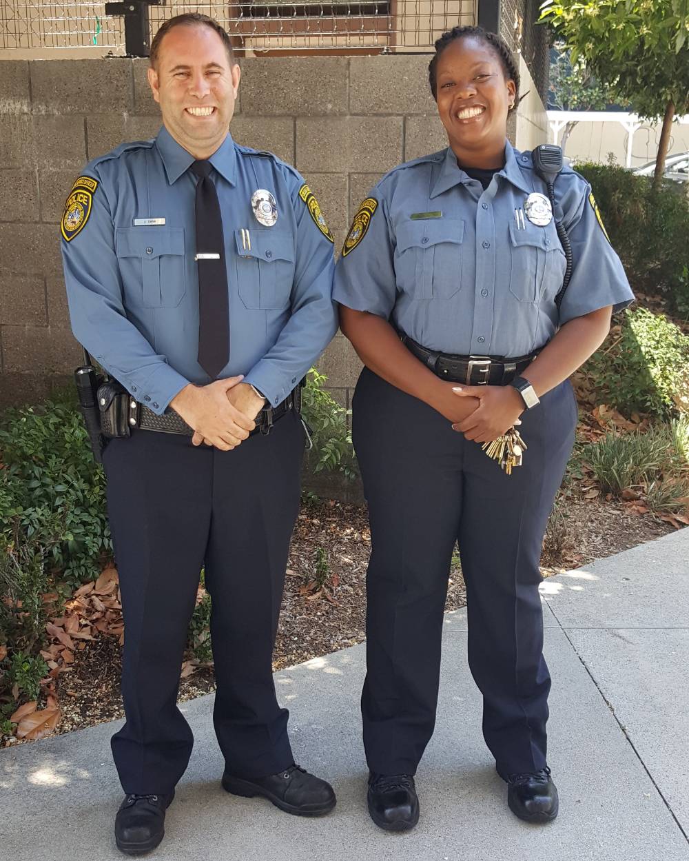 Two college service officers wear the new uniforms