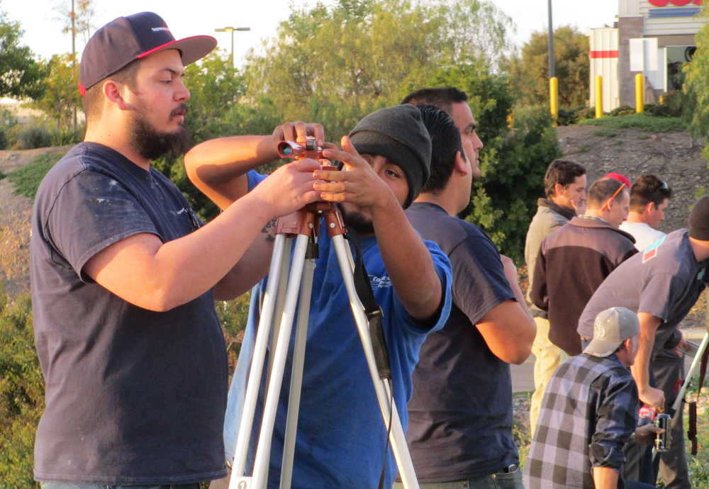 San Diego City College apprenticeship students work on land surveying equipment at the Associated Builders and Contracts training facility in Poway.