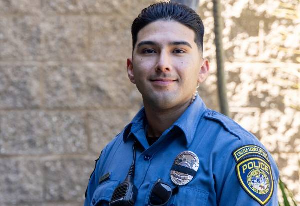 Dominick Ramos wearing a blue college service officer uniform