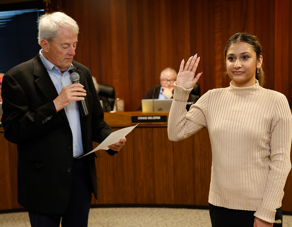 Bernie Rhinerson swears in Saigel Ghotra