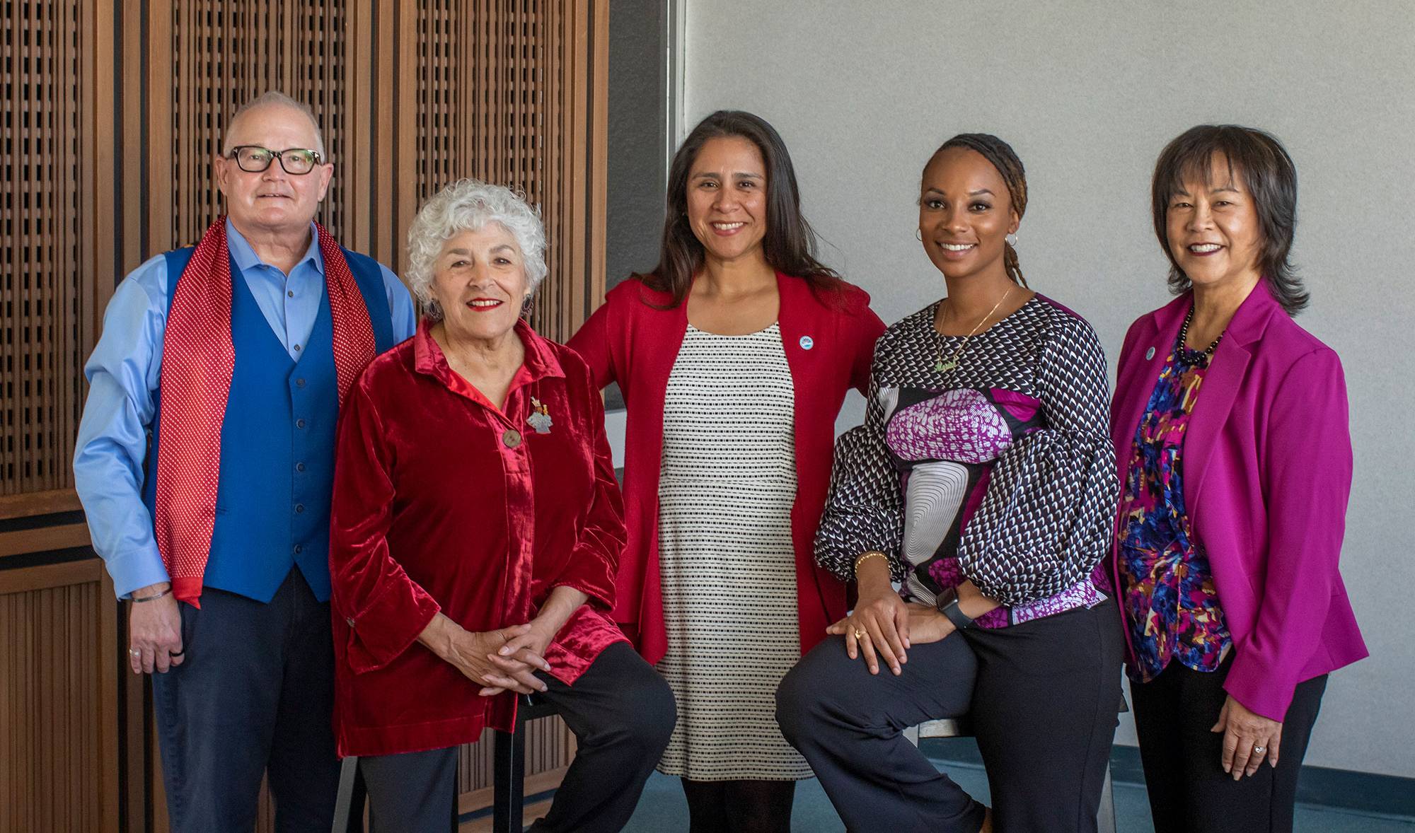 all five trustees in the lobby of the district office