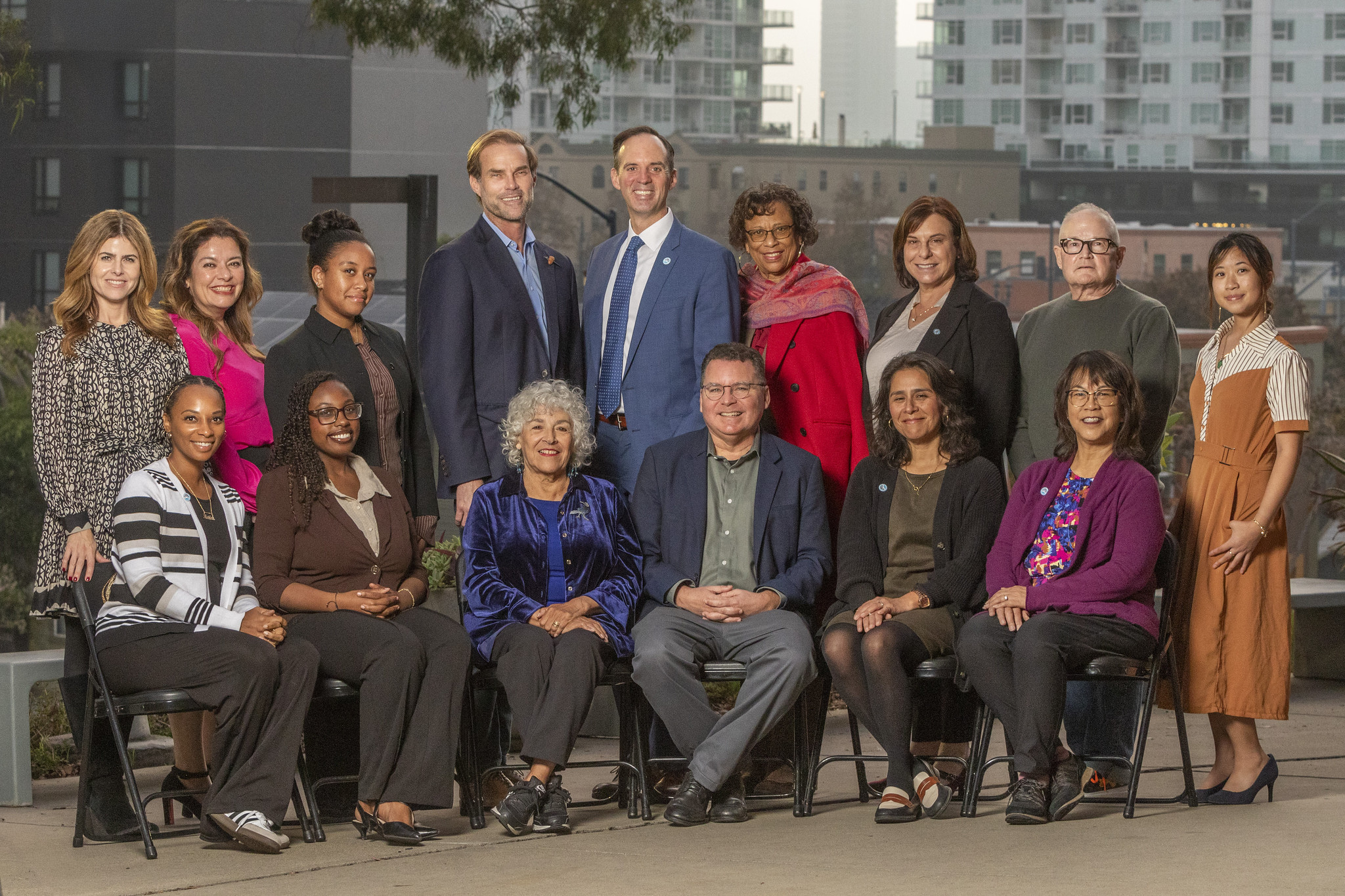 Trustees from both boards take a group photo