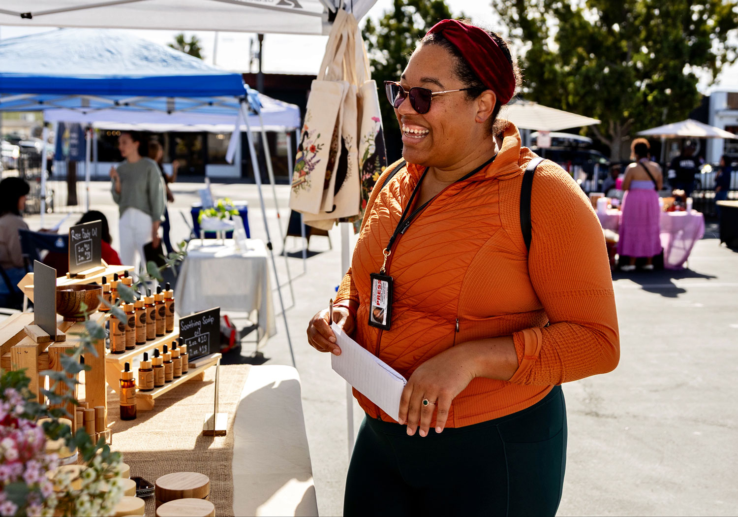 Lauren Map smiling at an outdoor market