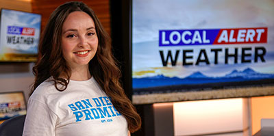 Former San Diego Promise student Jillian Fortner in the tv studio where she works
