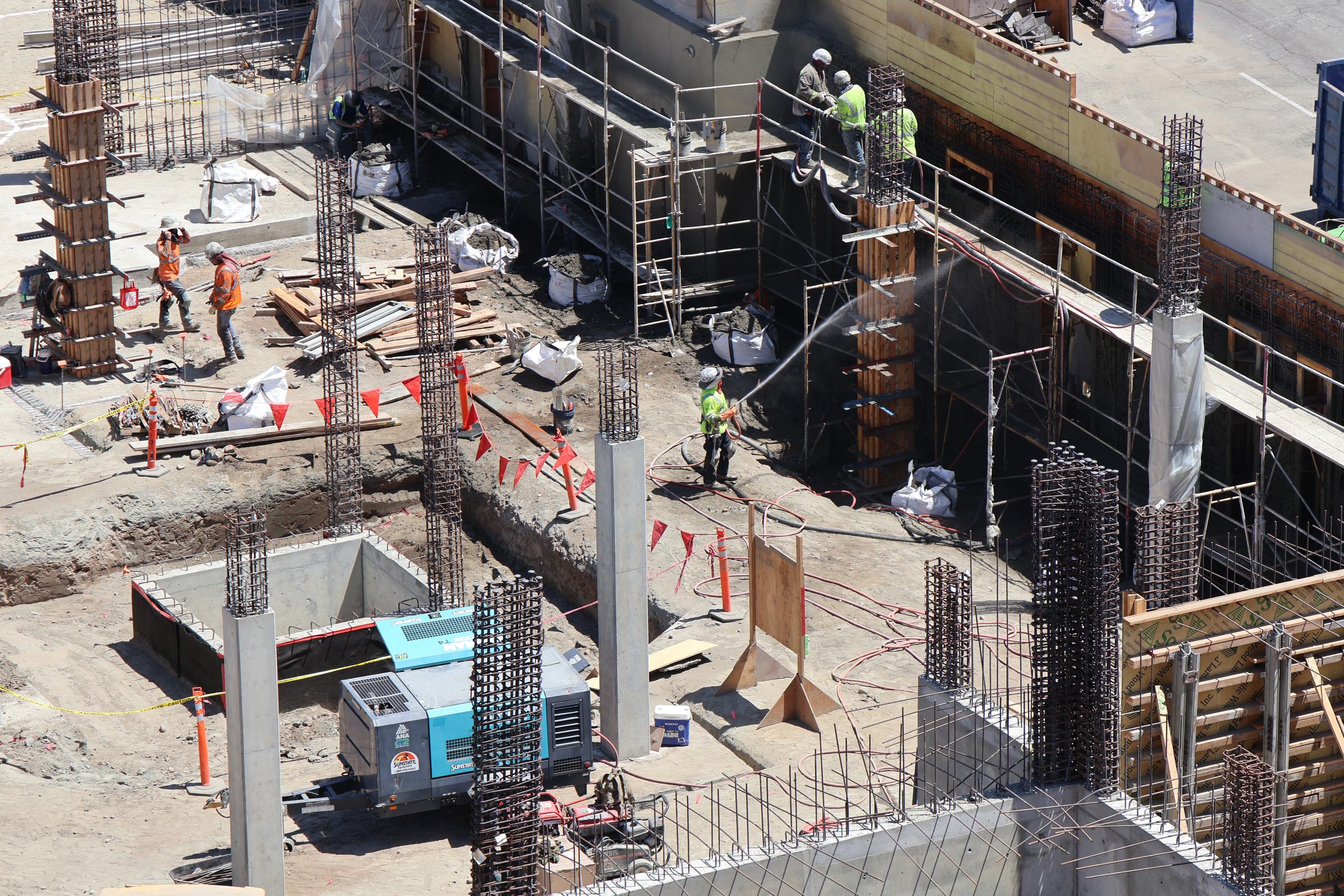 city_college_student_housing_overview of pillars and walls going up